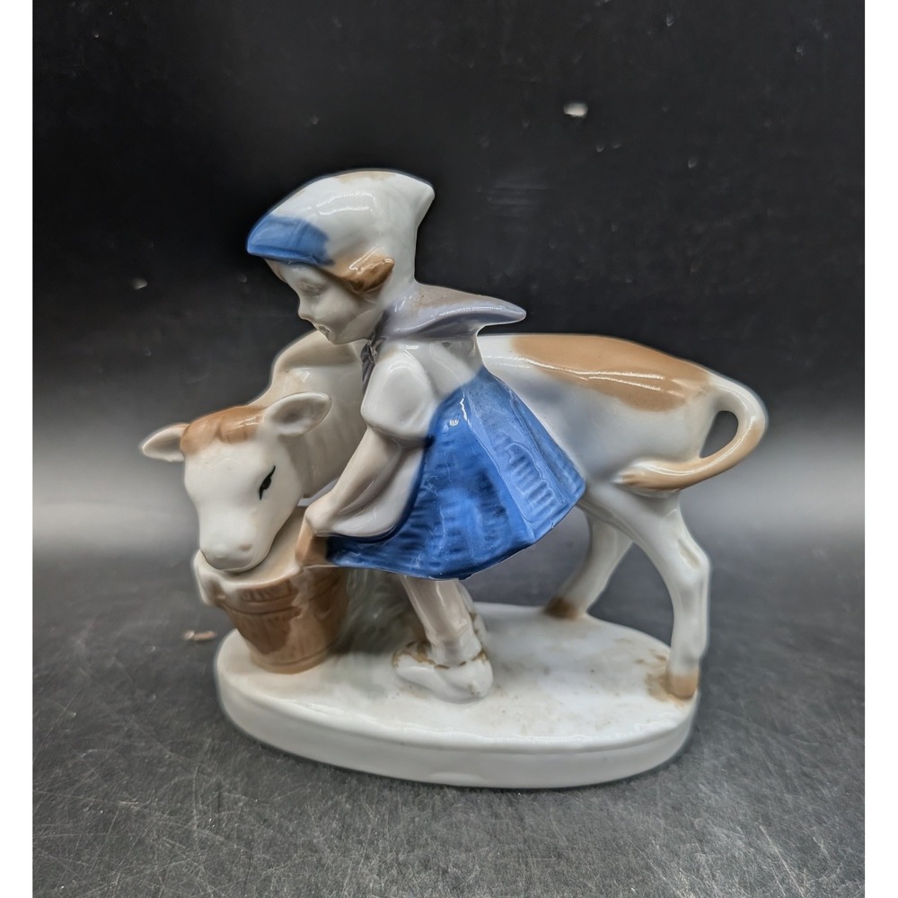 Vintage German Porcelain Figurine Girl with Calf Hand Painted Blue White 5"